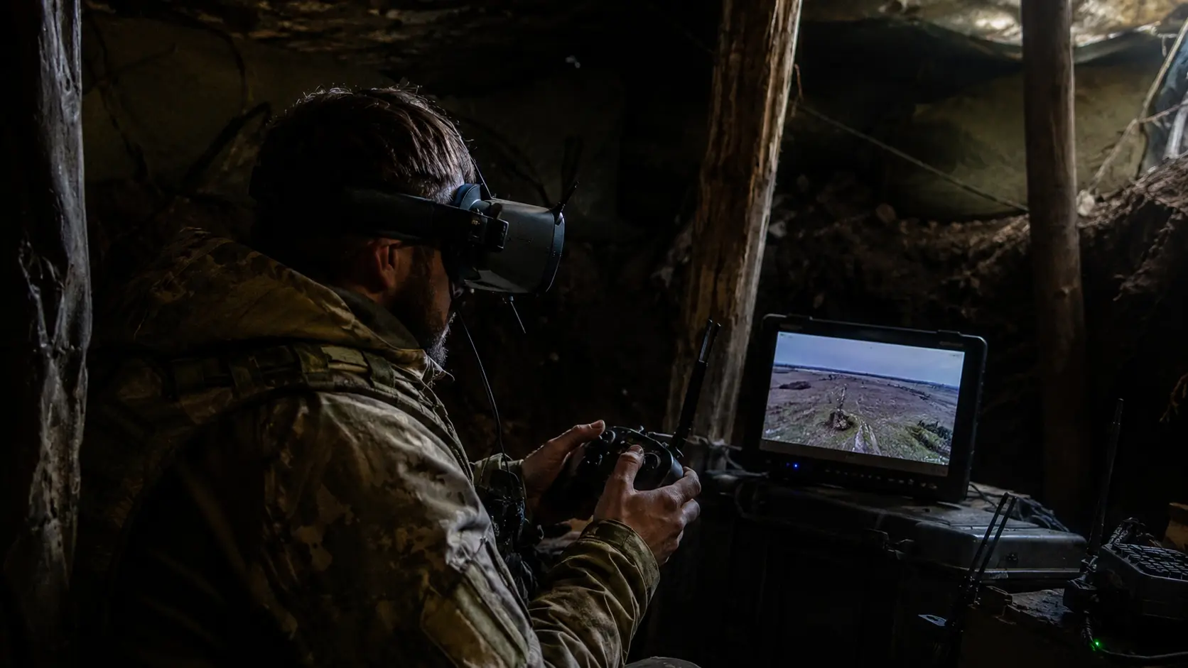 Soldier commanding drone